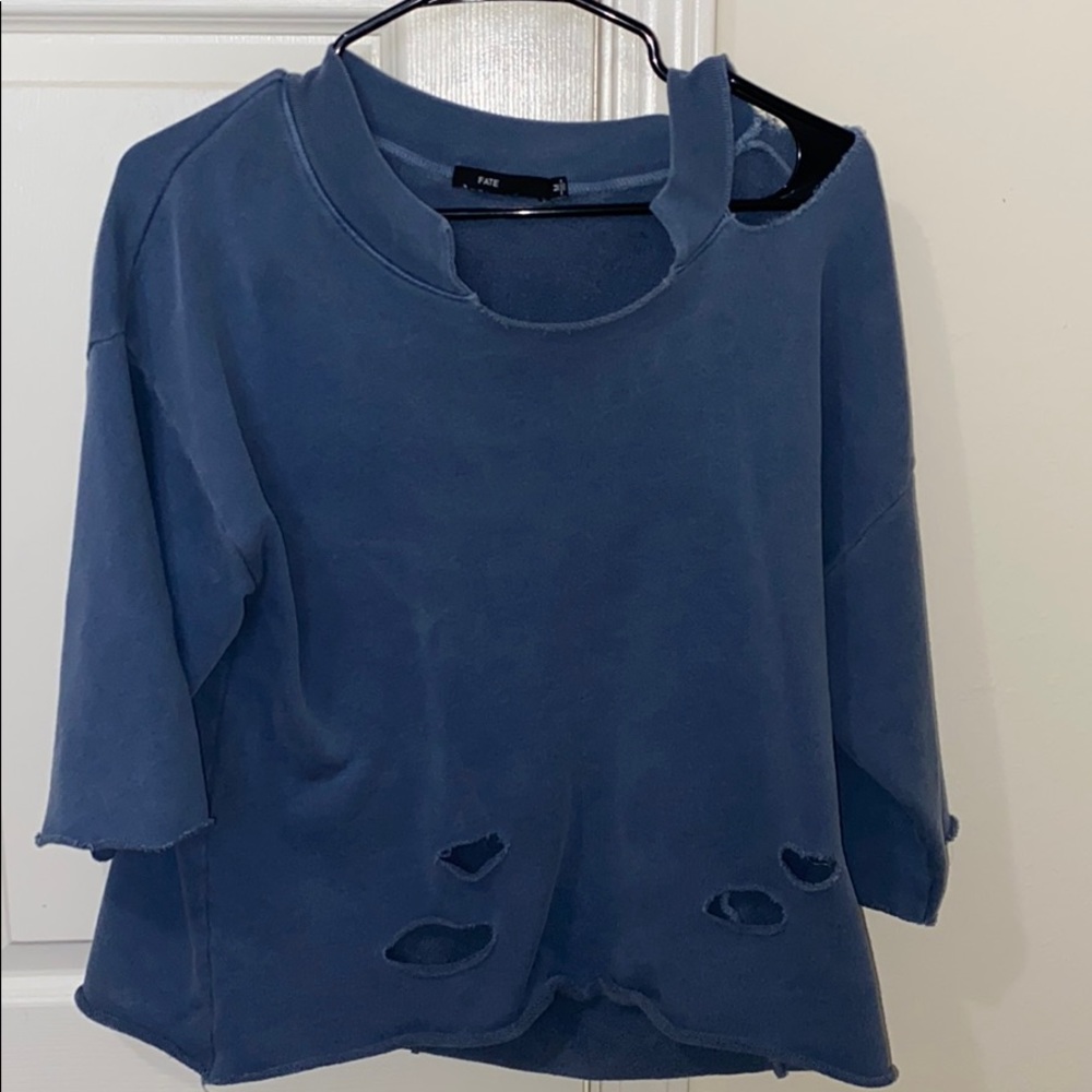 Distressed cropped sweater